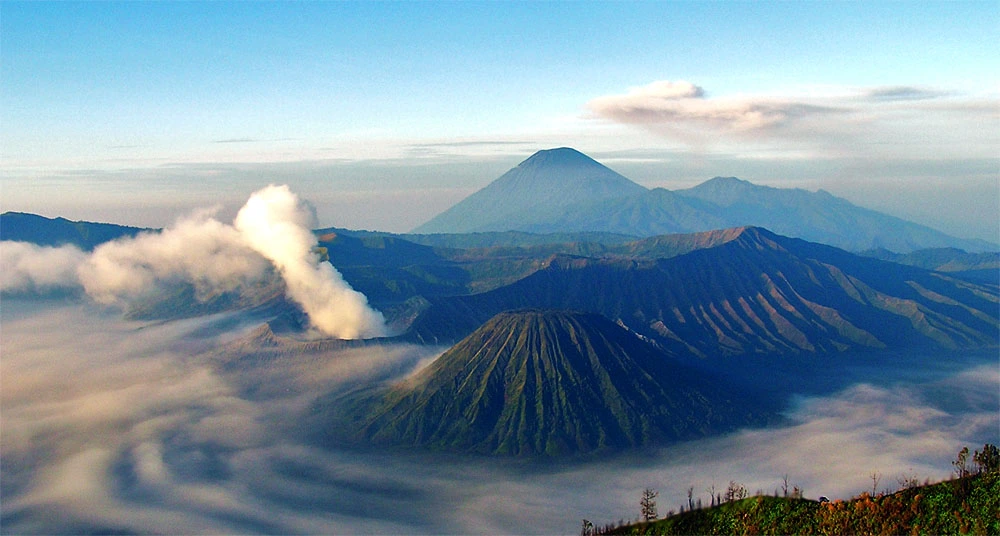 Sunrise and sea of clouds at Mount Bromo – iconic volcano to explore wonderful Indonesia